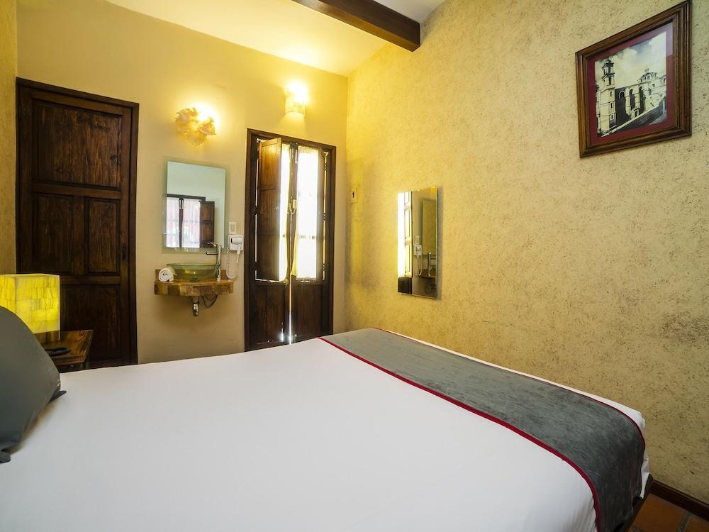 ホテル Collection O Al Otro Lado Del Rio, プエブラ エクステリア 写真 A room at the hotel