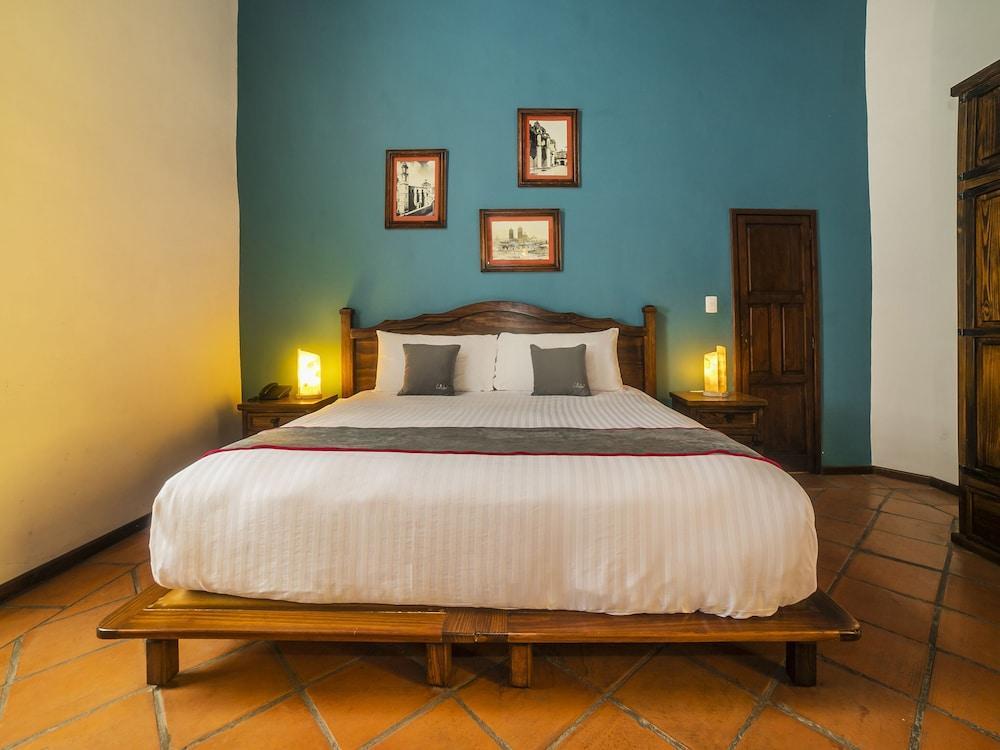 ホテル Collection O Al Otro Lado Del Rio, プエブラ エクステリア 写真 A bedroom at the hotel