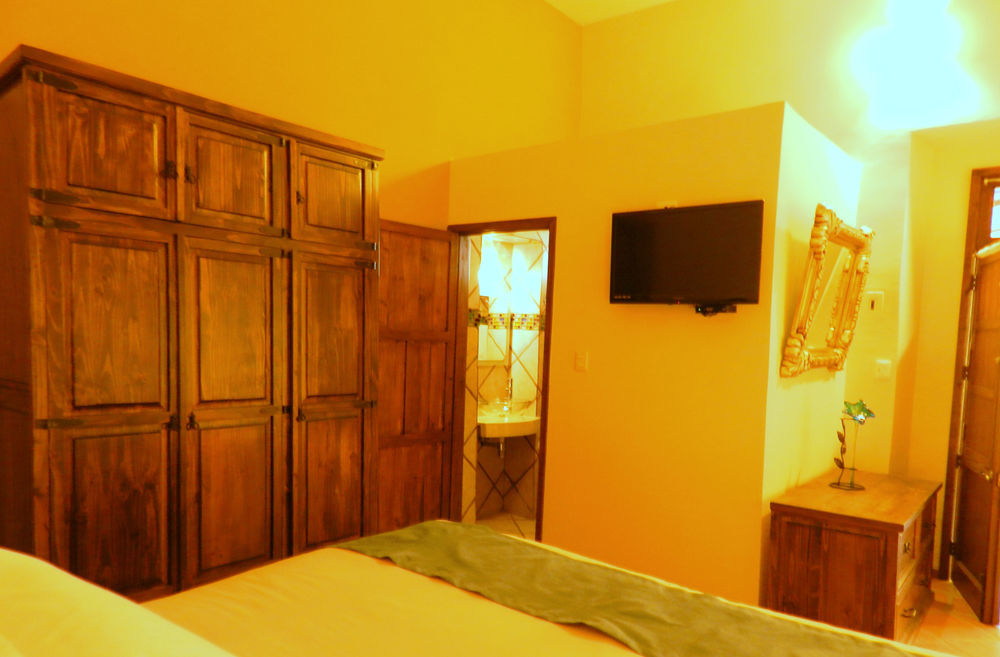 ホテル Collection O Al Otro Lado Del Rio, プエブラ エクステリア 写真 A room at the hotel