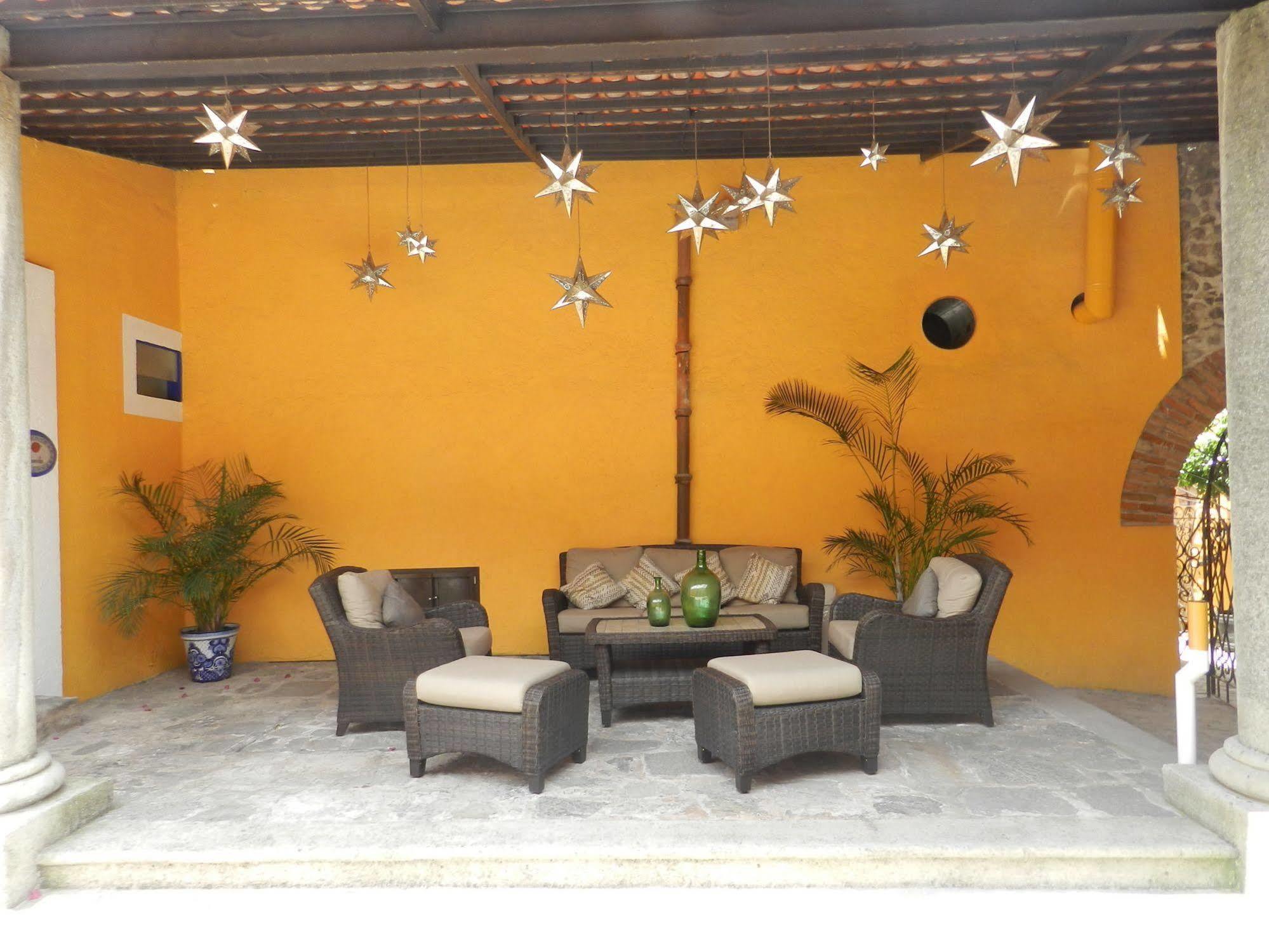 ホテル Collection O Al Otro Lado Del Rio, プエブラ エクステリア 写真 Interior of a typical house in San Cristóbal de Las Casas