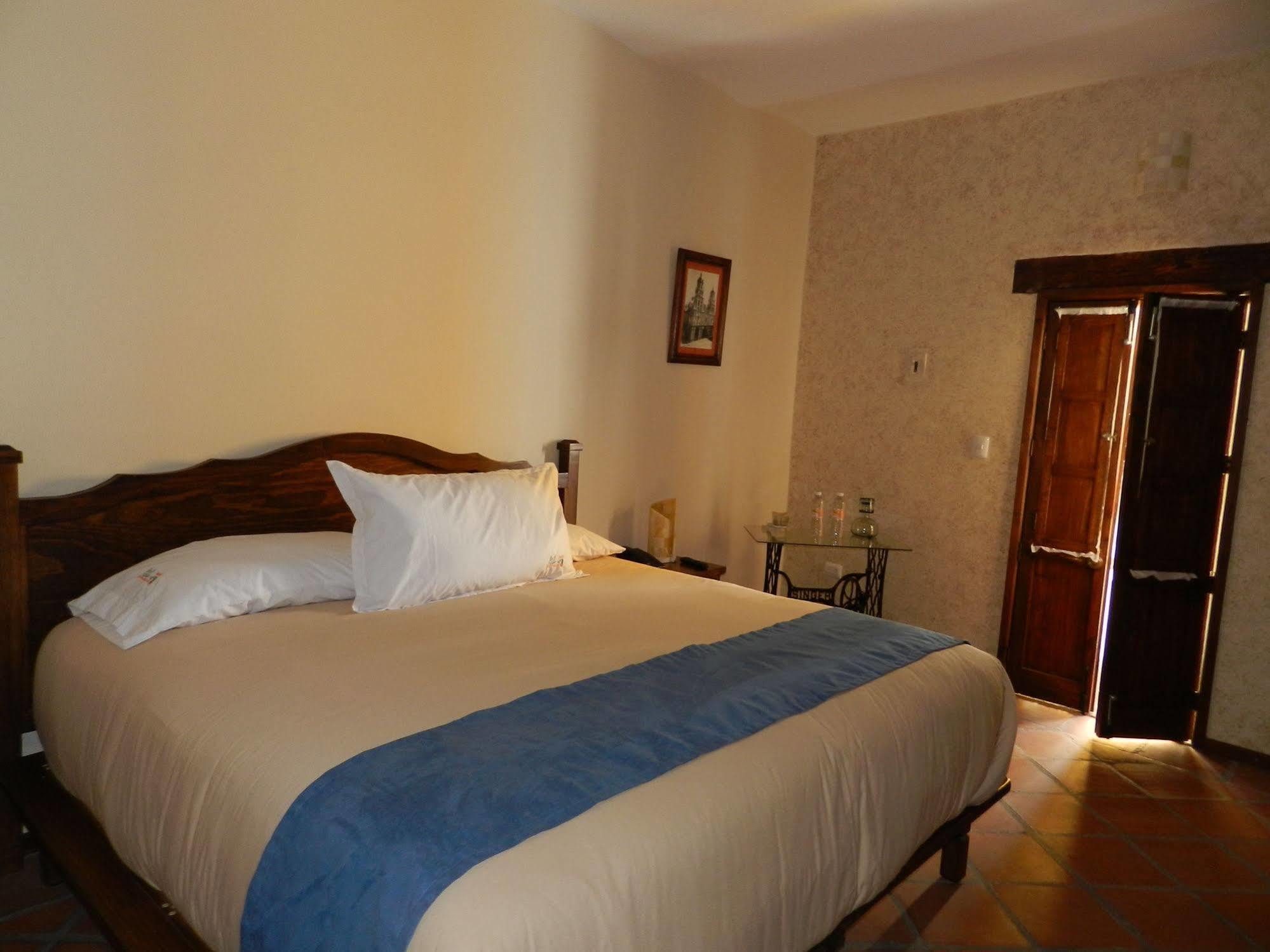 ホテル Collection O Al Otro Lado Del Rio, プエブラ エクステリア 写真 A bedroom at the hotel